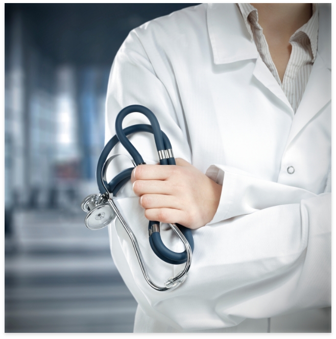 A doctor at Bonneville Family Practice holds a stethoscope, ready to provide medical care and support to patients.